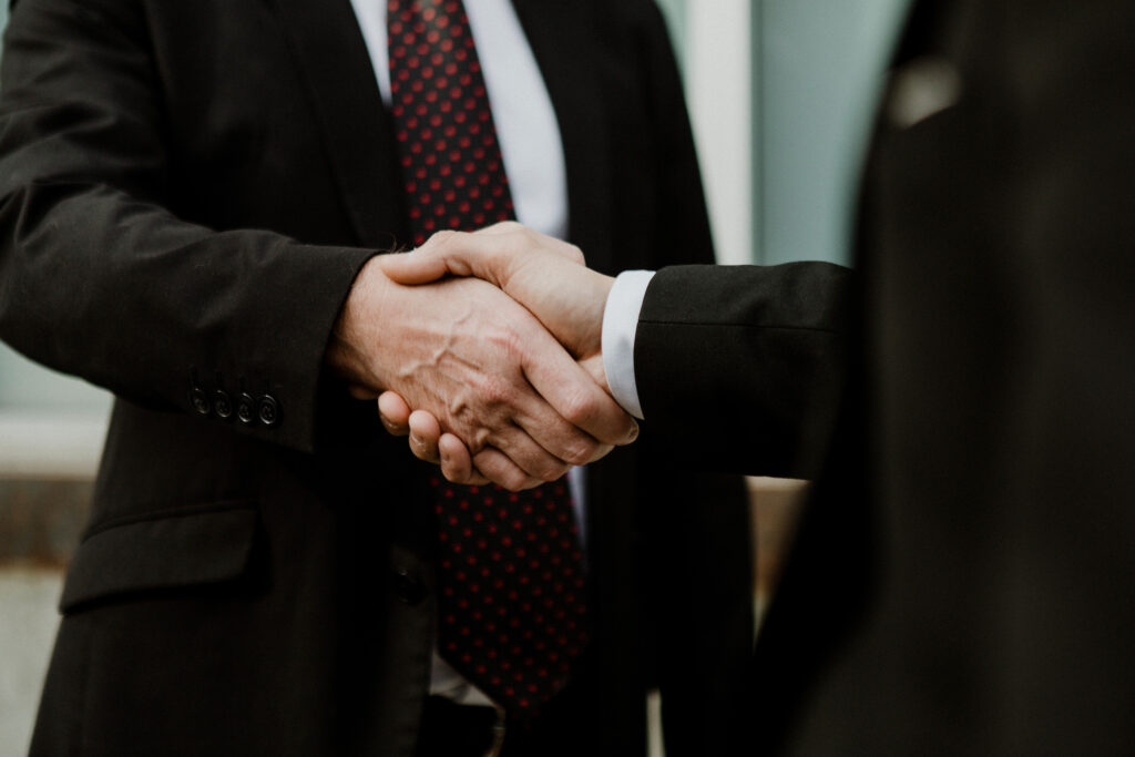 a pennsylvania personal injury lawyer shakes hands with a client